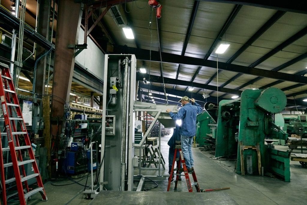 EnSight Solutions engineer reviewing industrial equipment